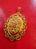 Médaillon ancien ouvrant or 18 carats