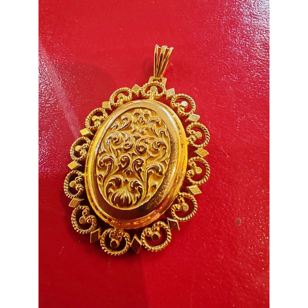 Médaillon ancien ouvrant or 18 carats