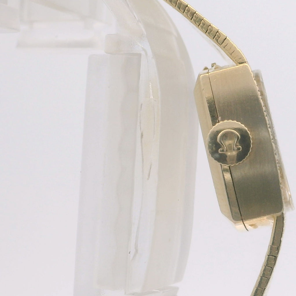 Montre omega femme vintage en or 14 carats-