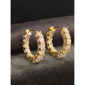 Boucles d'oreilles créoles en or 18 carats, serties de diamants ronds taille brillant « inside-out » d'un poids total de