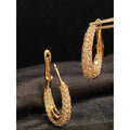 Boucles d'oreilles créoles en or 18 carats, serties de diamants ronds taille brillant « Inside-Out » d'un poids total de