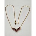 Collier de 17 pouces en or jaune 14 carats, orné de 7 rubis ovales de 4 mm x 6 mm et de 3 diamants rond