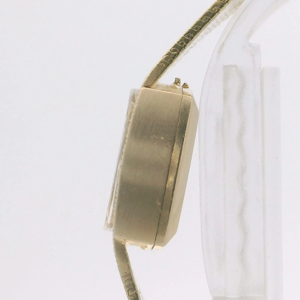 Montre omega femme vintage en or 14 carats-
