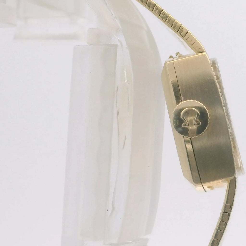 Montre omega femme vintage en or 14 carats-