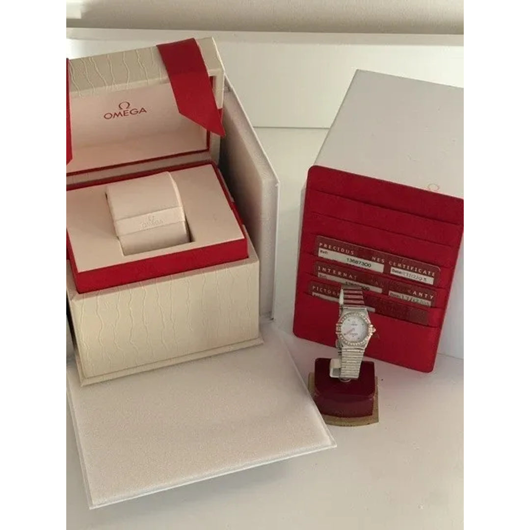 Montre femme Omega Constellation or 18 carats et lunette diamant acier série complète 2003