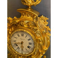 Pendule cartel en bronze doré de style Louis XV