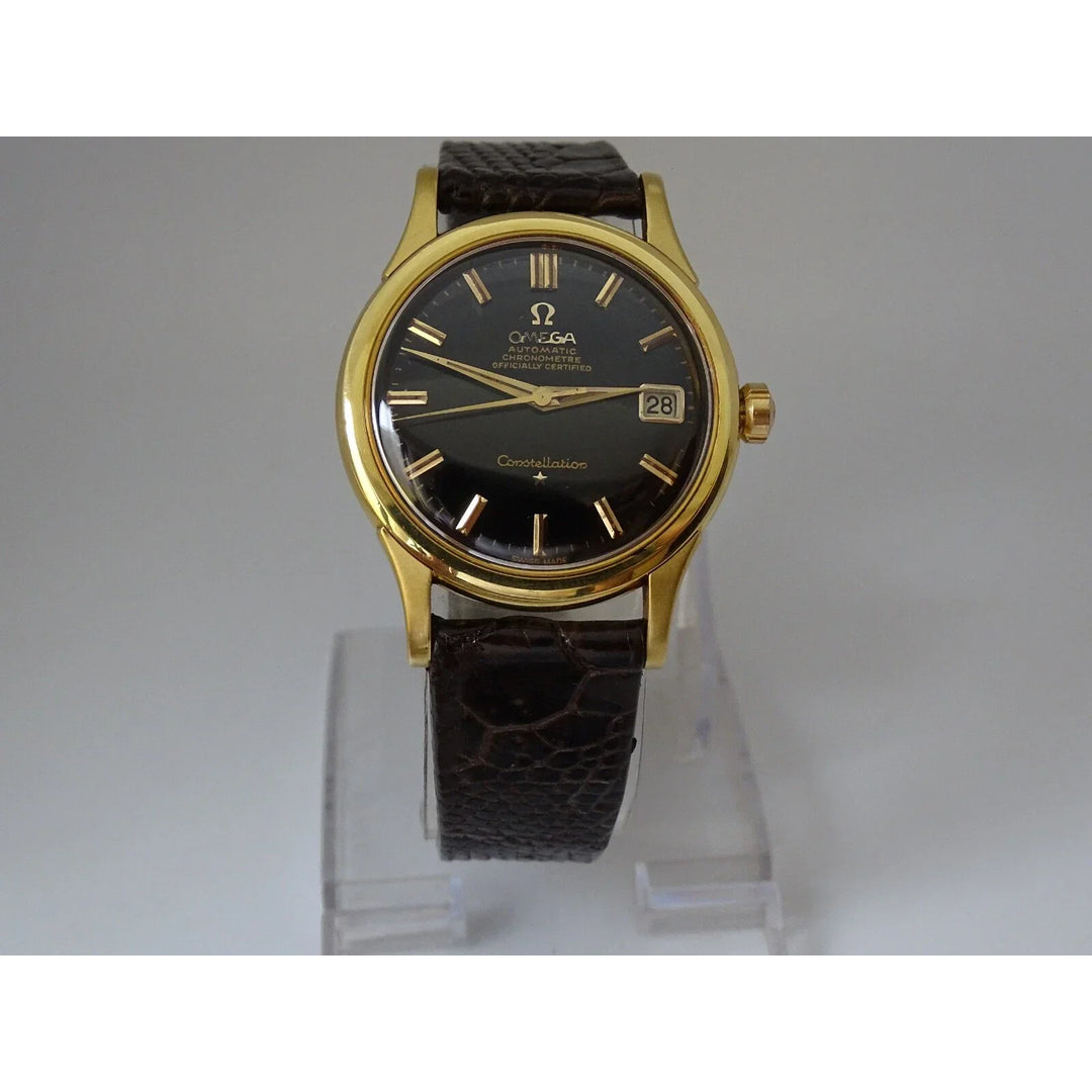 Montre Omega Constellation automatique or massif 18 carats vintage